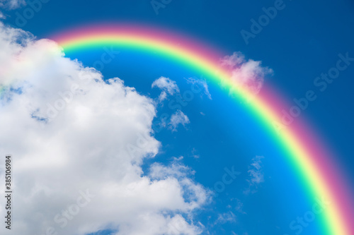 beautiful rainbow and blue sky background © pushish images