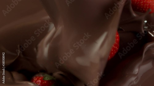 Wallpaper Mural Super slow motion of pouring dark hot chocolate with strawberries. Filmed with cinema high speed camera, 1000fps. Torontodigital.ca
