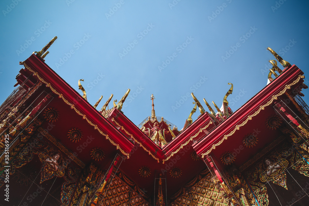 Beautiful traditional Thai Buddhist building's roof. Bottom view of art on Thai temple roof church. Beautiful traditional Thai Buddhist building's roof. Bottom view of art on Thai temple roof church.