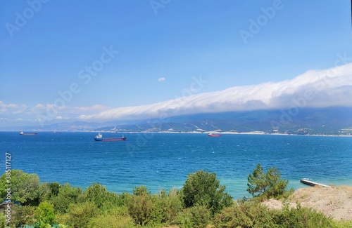 sea, clouds and mountain
