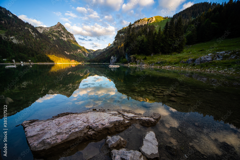 Fototapeta premium Lake in the swiss alps at sunrise