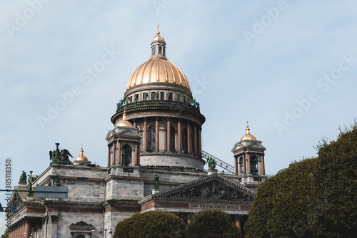 Orthodox St. Isaac  Cathedral in the classical style in cloudy weather against the sky in St. Petersburg