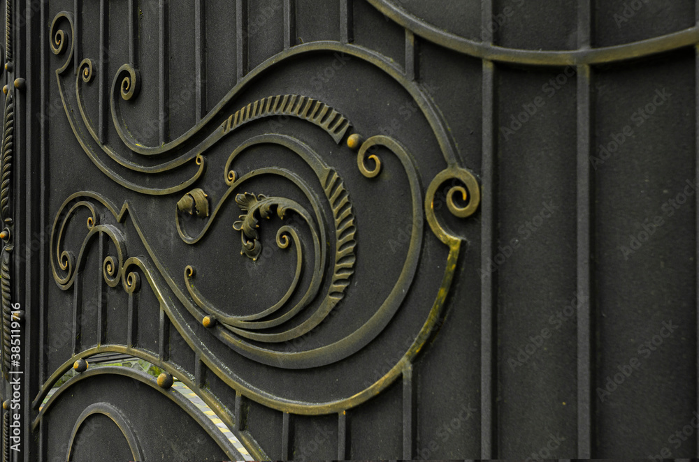 Decorative elements of forged ornaments of metal gates