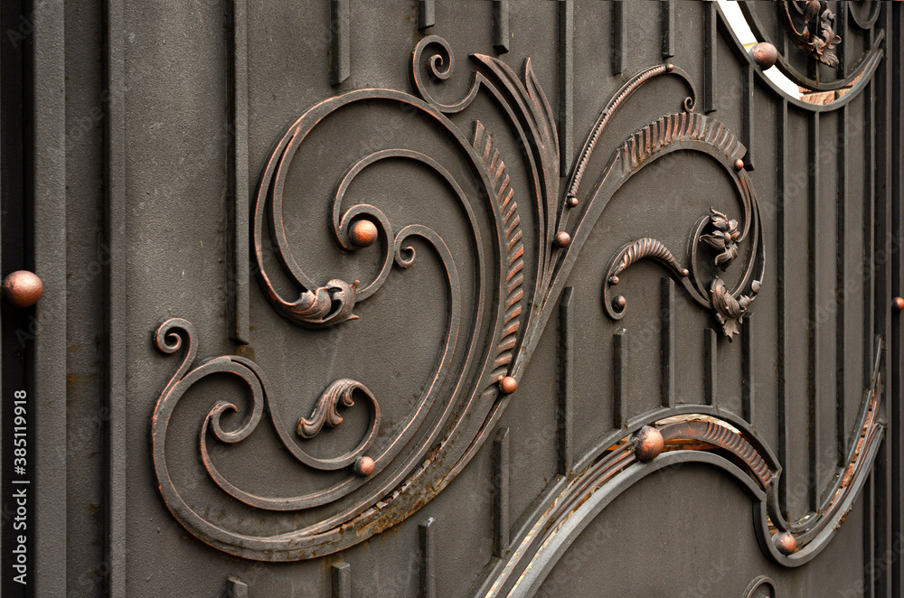 Beautiful abstract forged elements of modern metal gates Beautiful abstract forged elements of modern metal gates