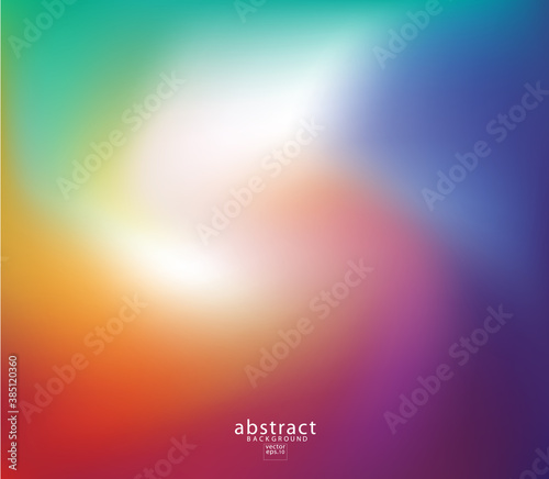 Abstract blurred gradient mesh background bright rainbow colors. © bebuntoon