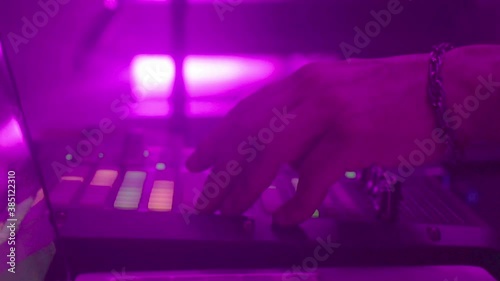 technican adjusting sound at a concert, dj photo