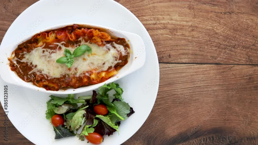 Rotating Plate of Lasagna and a Salad Rotating Plate of Lasagna and a Salad