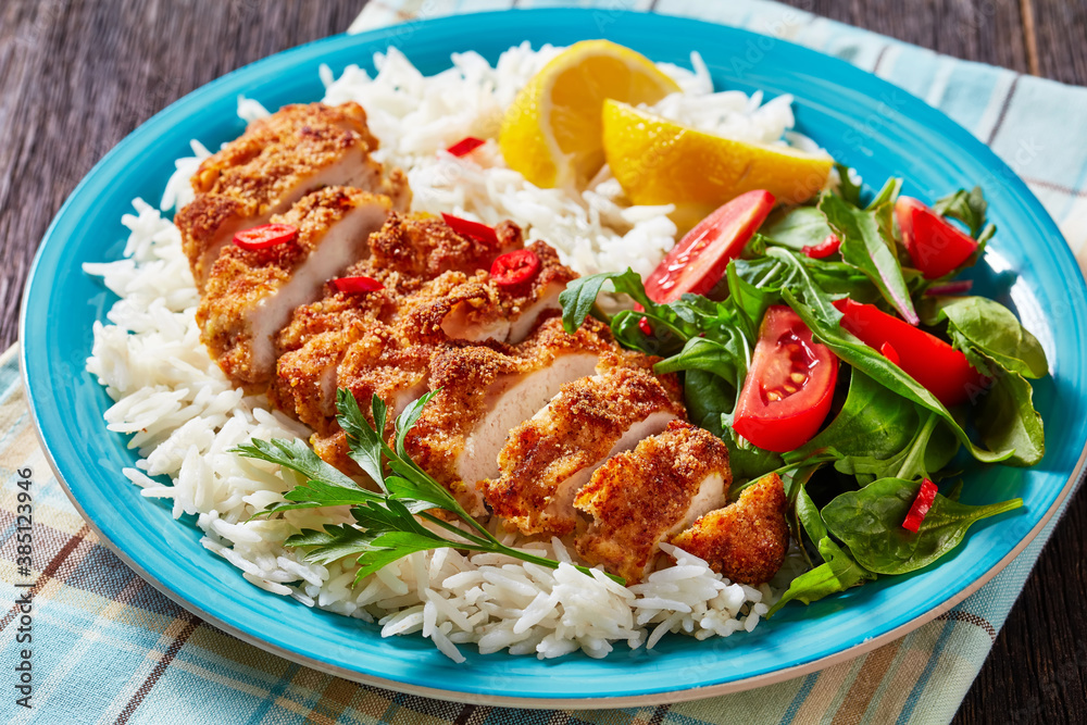 Chicken Cutlet Rice Bowl on a a plate