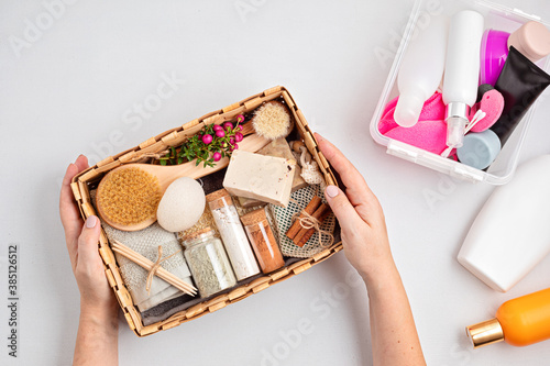 Preparing self care package, seasonal gift box with zero waste cosmetics vs industrial plastic products