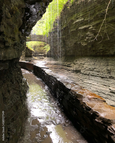 Stream, waterfalls, cliffs and rocks. Hiking trail at Watkins Glen State Park, Upstate New York, south of Seneca Lake in Finger Lake Region
