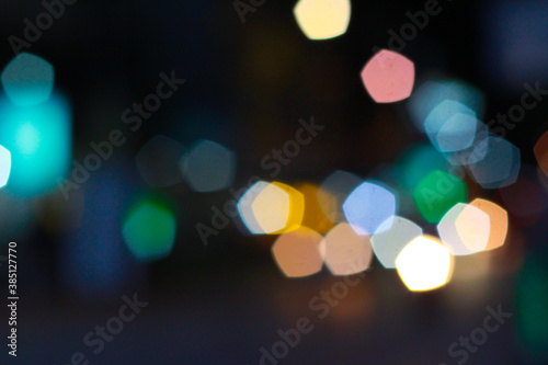 Boogie and night lights dark background.Defocused abstract blur