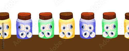 Eyeballs in glass bottle jar seamless Halloween border. Hand drawn Halloween art illustration. Spooky horizontal repeating border