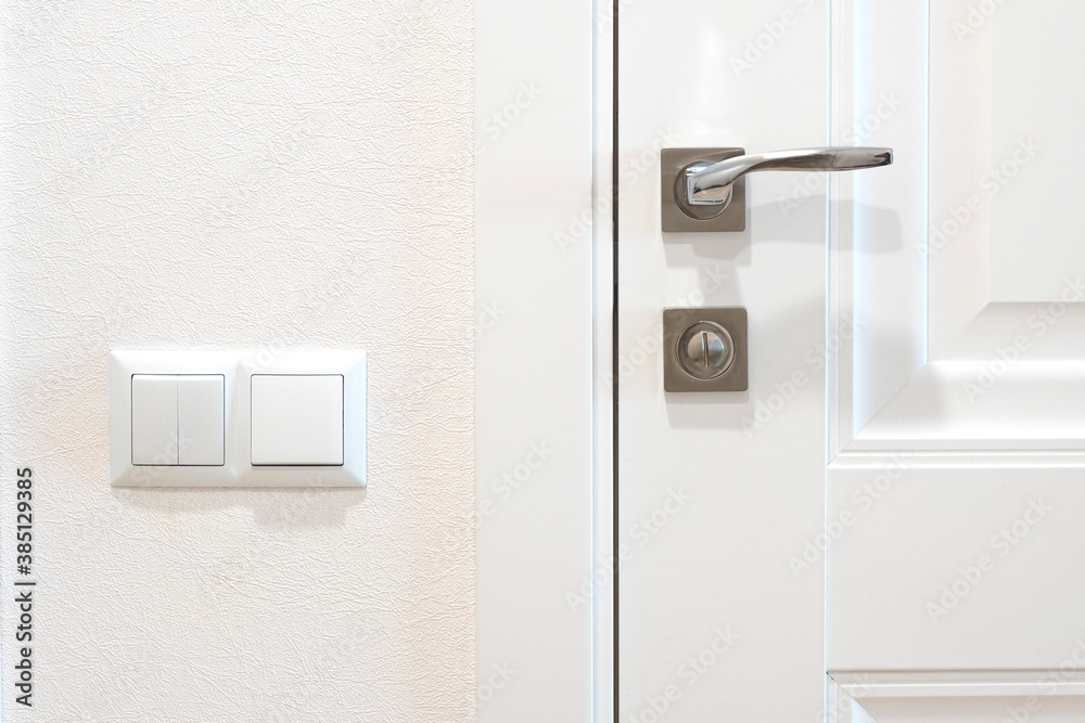 White doors. Two switches White doors. Two switches