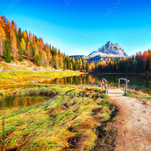 Stunning view of popular travel destination mountain lake Antorno in autumn photo