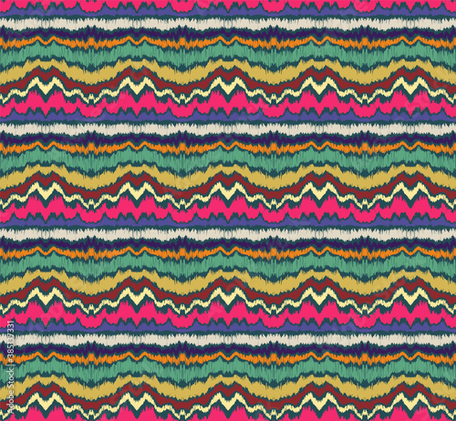 Ikat border. Geometric folk ornament. Ink on clothes. Tribal vector texture. Seamless striped pattern in Aztec style. Ethnic embroidery. Indian, Scandinavian, Gypsy, Mexican, African rug.