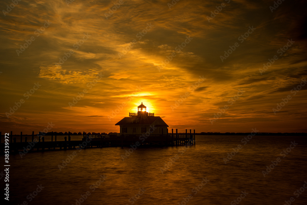 Lighthouse with Sun Rising Behind