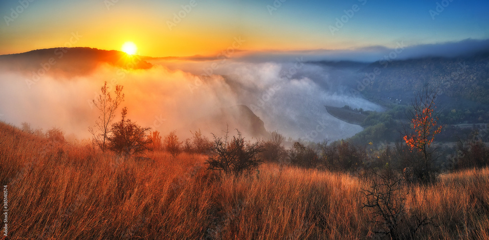 fog in the canyon. Autumn morning in the Dniester river valley