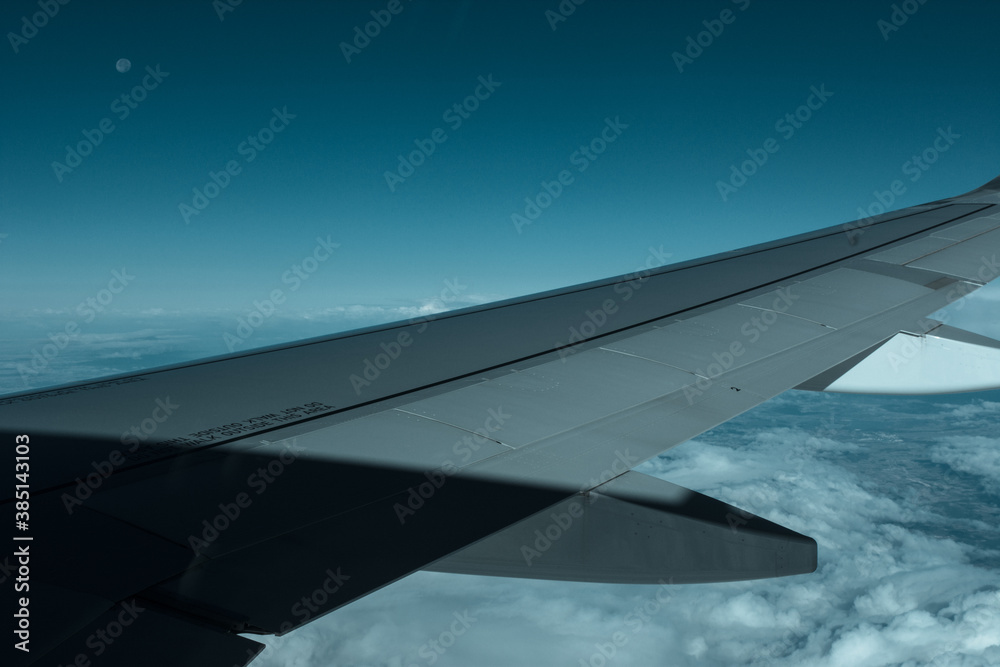 airplane wing with clouds airplane wing with clouds