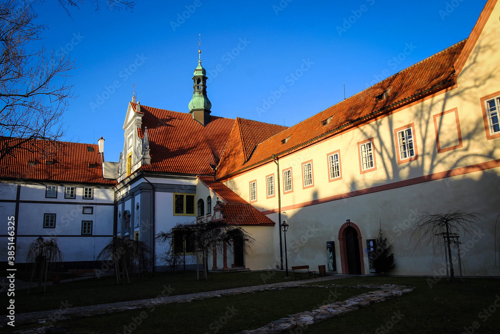 Minoritsky monastery view by bright winter noon, Cesky Krumlov, Czech Republic