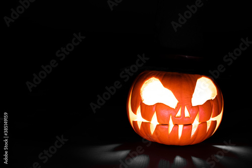 halloween pumpkin glowing homemade carved pumpkin with shadows