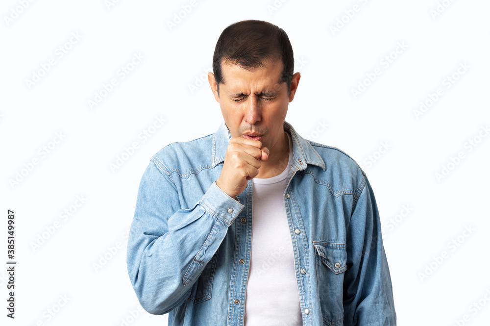 Handsome man wearing winter shirt over isolated background. Feeling unwell and coughing as symptom for cold or bronchitis. Healthcare concept. Handsome man wearing winter shirt over isolated background. Feeling unwell and coughing as symptom for cold or bronchitis. Healthcare concept.