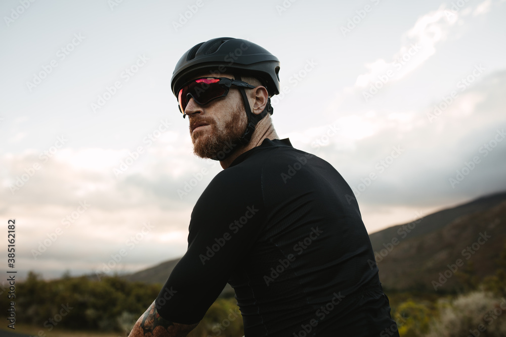 Cyclist making a short break during training Cyclist making a short break during training