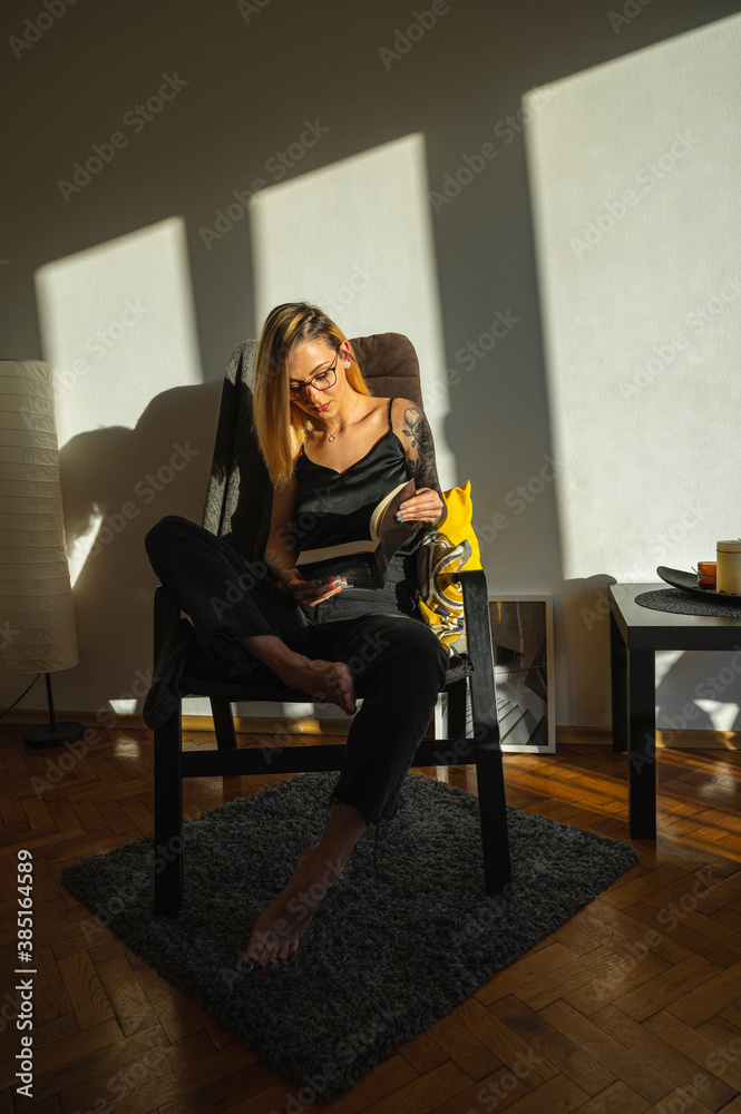 Beautiful woman reading book at home Beautiful woman reading book at home