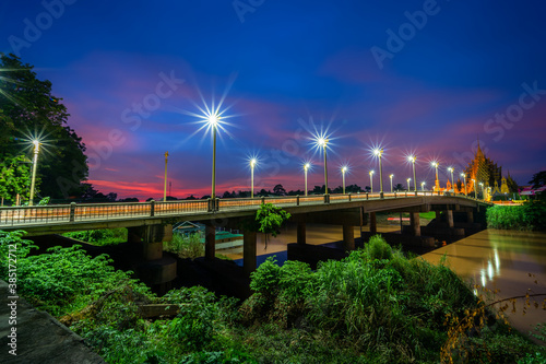 The color of Night traffic light on the road on the bridge (Suphankanlaya Bridge) in Phitsanulok, Thailand.