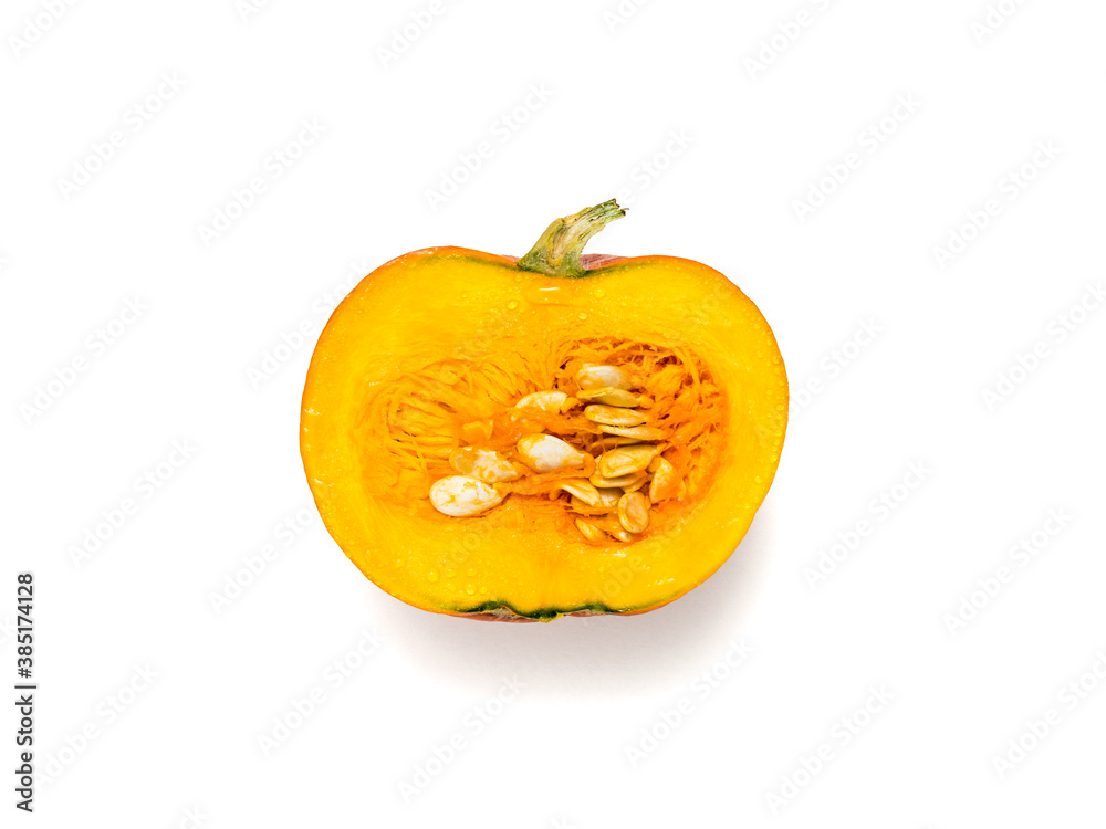Half of a ripe pumpkin isolated on a white background.
