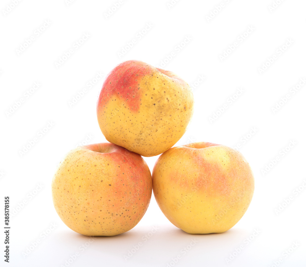 Three golden apples on white background Three golden apples on white background