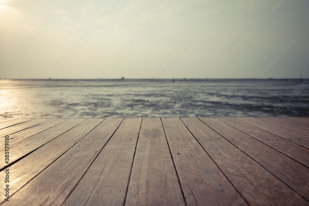 Wood floor extending into the sea