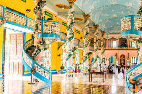 Interior and decoration inside a Cao Dai Temple in Tay Ninh province, near ho chi minh city, Vietnam © CravenA