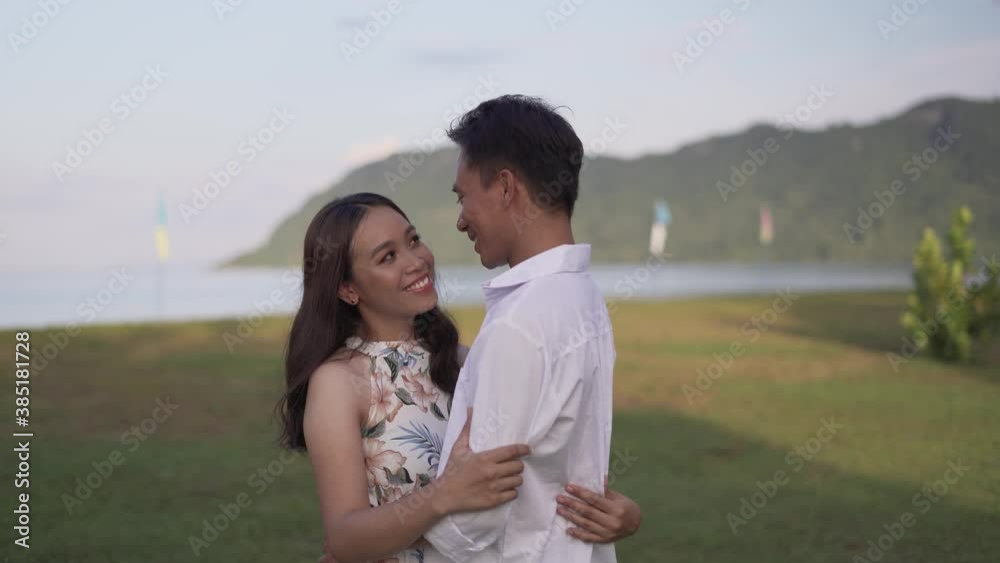Beautiful and Sweet Filipino Couple Smiling While Looking At Each Other in the Philippines - Closeup Shot Beautiful and Sweet Filipino Couple Smiling While Looking At Each Other in the Philippines - Closeup Shot