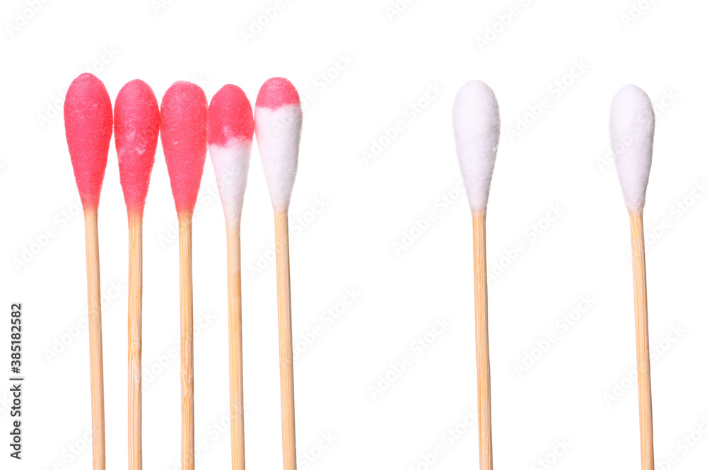 Social Distancing concept staying physically apart for infection control using red cotton bud sticks as a metaphor for containing corona virus outbreak - health and medical concept image . Social Distancing concept staying physically apart for infection control using red cotton bud sticks as a metaphor for containing corona virus outbreak - health and medical concept image .