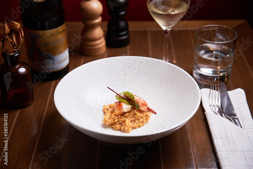 Risotto with lobster dish in a high cuisine restaurant