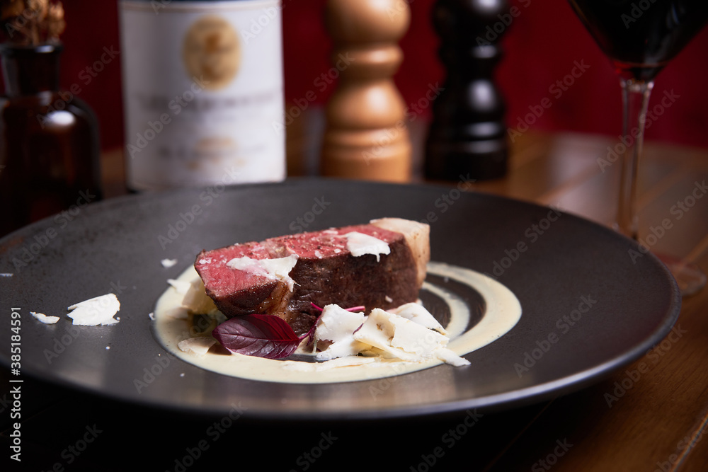 Ribeye with white truffle slides in high cuisine restaurant Ribeye with white truffle slides in high cuisine restaurant