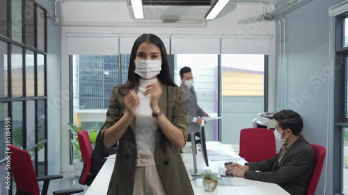 Asian business people wear face mask as new normal in office meeting 