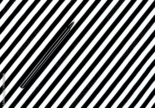 striped pen on a striped background, black and white stripes, copy space, minimalism, contemporary style
