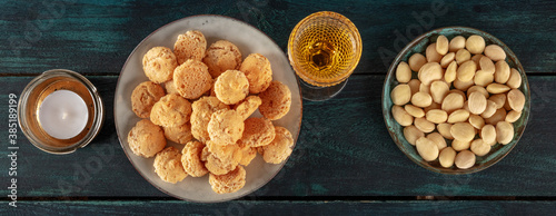 Принти на полотні Amaretti, traditional Italian almond cookies, a panorama with a glass of Amarett
