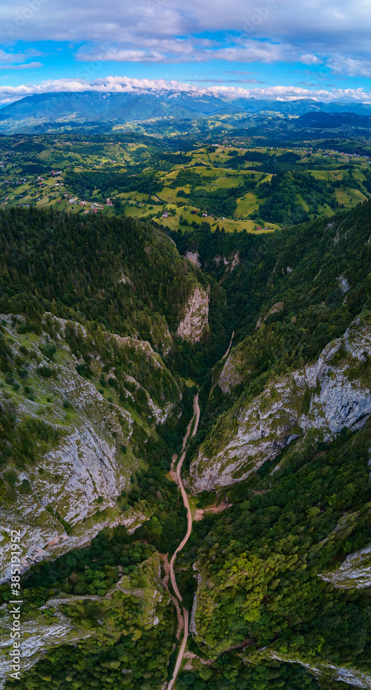 Aerial view above the gorge of Prapastiile Zarnestiuui in Piatra Craiului Mountains, Transylvania, Romania
