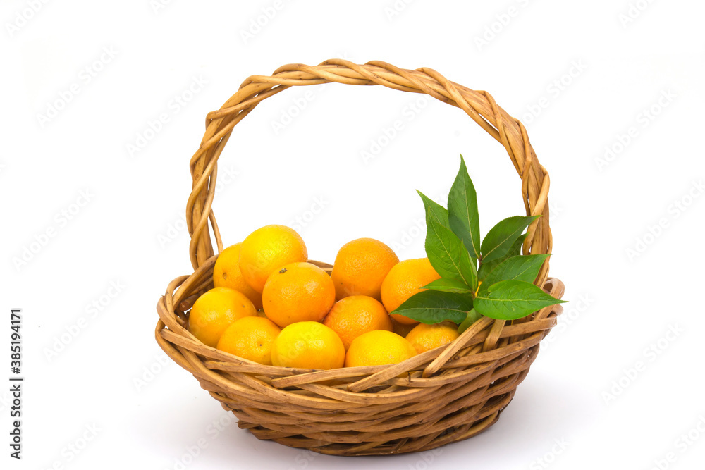 tangerines in a basket on white background tangerines in a basket on white background