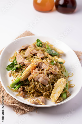 Fried jade noodles with soy sauce and pork