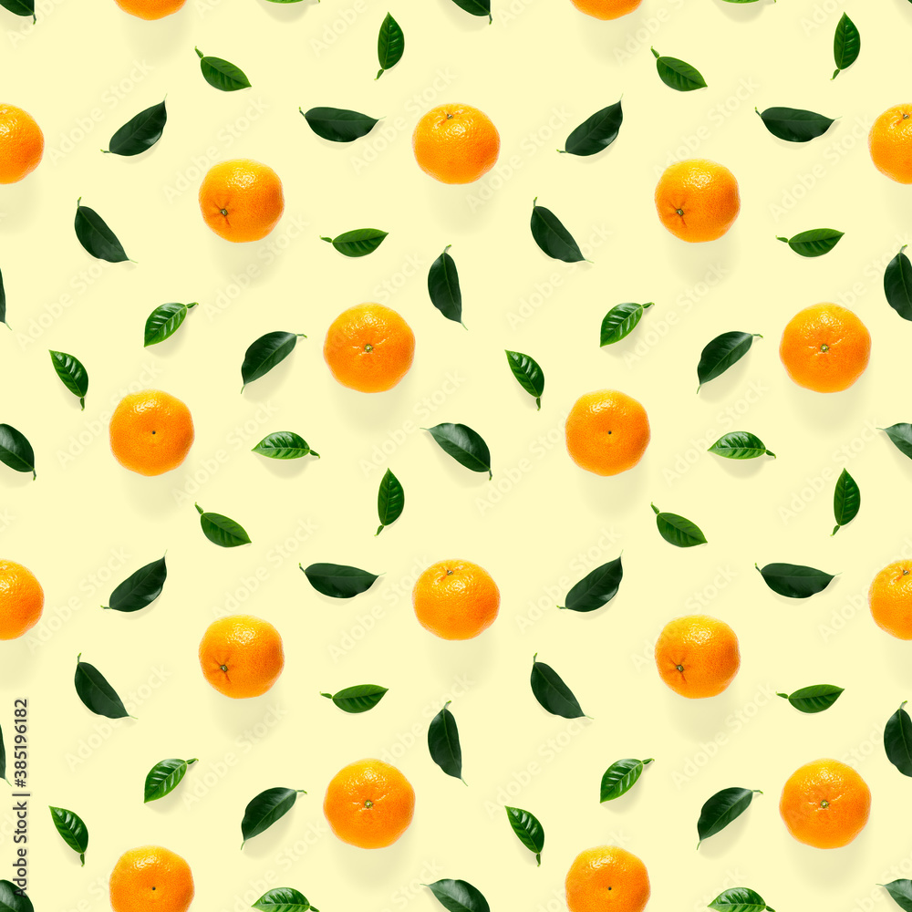 Mandarine seamless pattern, tangerine, clementine isolated on yellow background with green leaves. Collection of fine seamless patterns. Mandarine seamless pattern, tangerine, clementine isolated on yellow background with green leaves. Collection of fine seamless patterns.