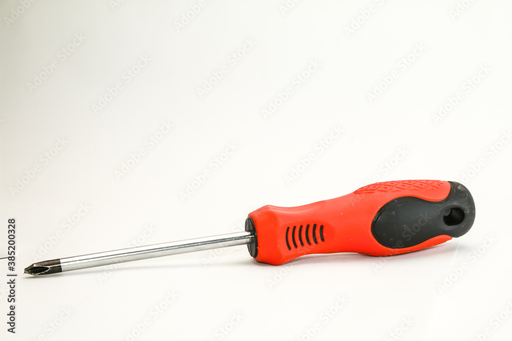 Red screwdriver on white background Red screwdriver on white background