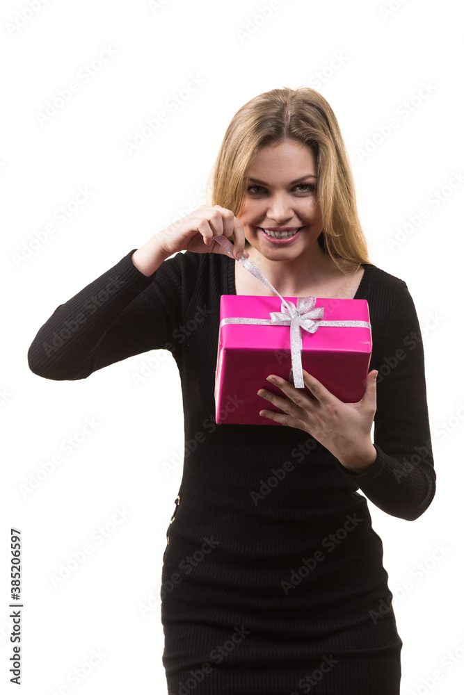 Fototapeta premium Girl opening pink gift box