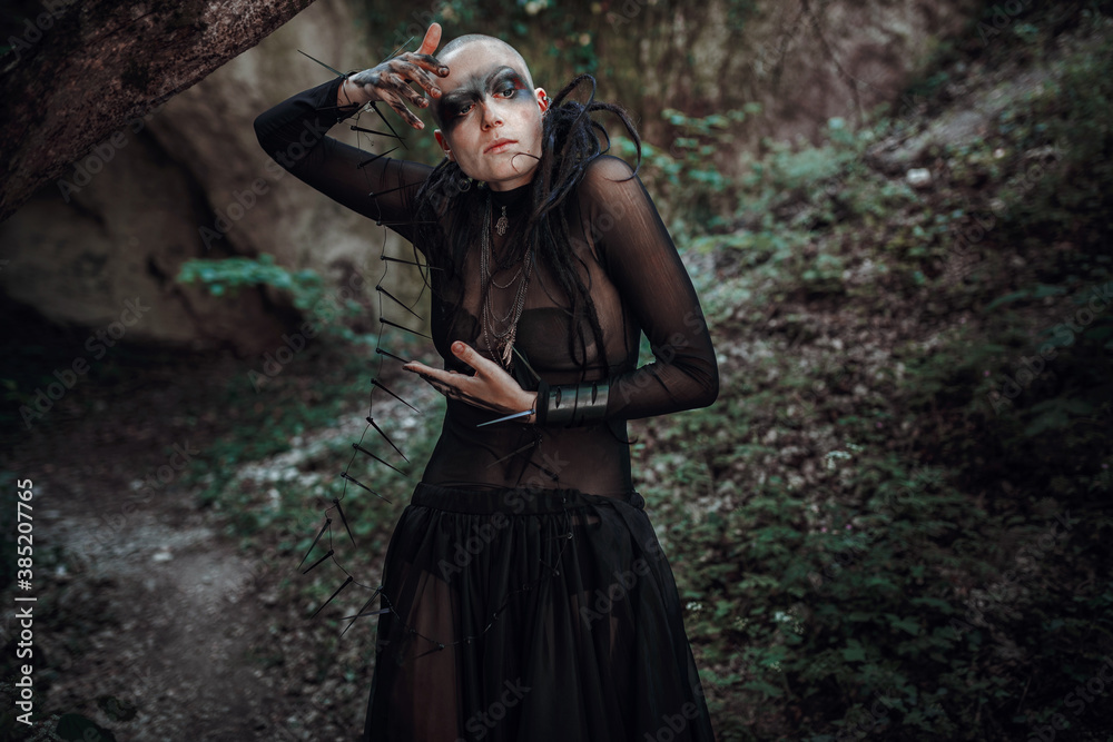 Naklejka premium Beautiful young bald woman portrait outdoors. spiritual concept.