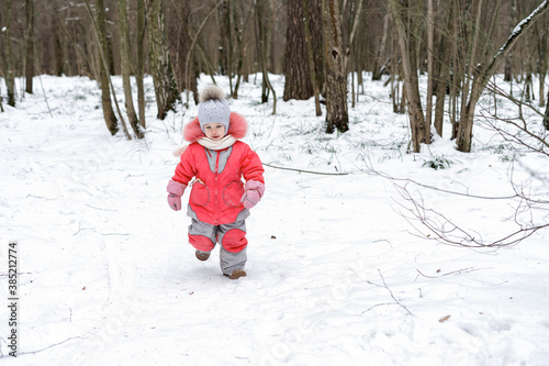 Little girl having fun on winter day. fun in the fresh air for a Christmas mood