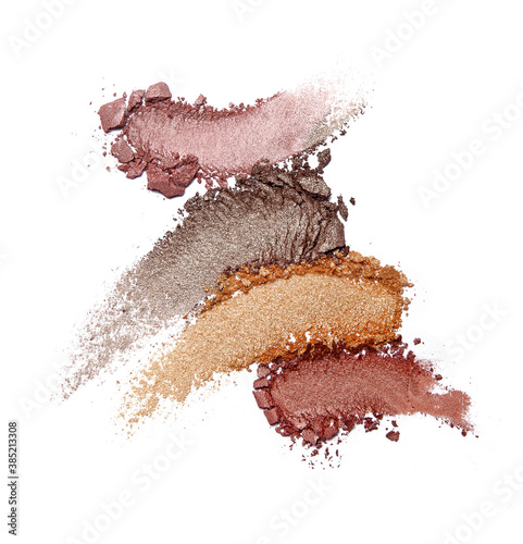 Crushed eyeshadow isolated on white photo