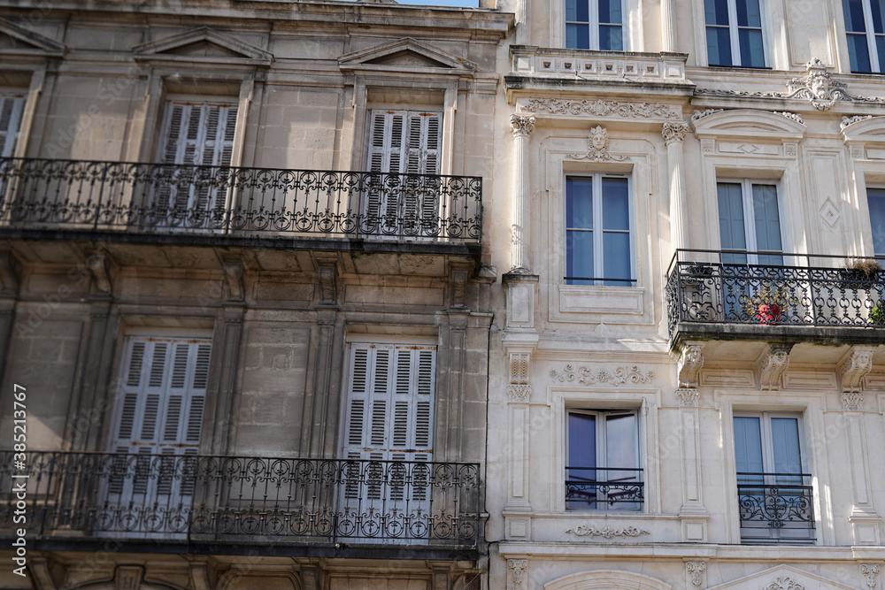 before and after comparison of clean building facade versus wash clean house facades and dirty one