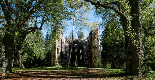 The ruins of the church of St. John the Baptist in western Bohemia in the Czech Republic among the trees 